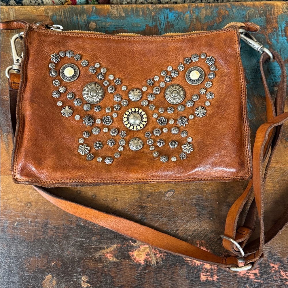 Campomaggi cognac leather mini bag with beautiful butterfly configuration studs!